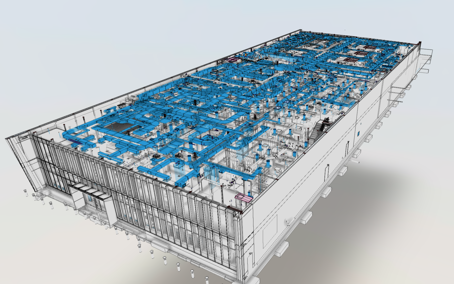 Aerial cutaway view of the complete LOD 400 plumbing coordination model for the NYU Langone Patchogue Ambulatory Surgical Center, showing the full extent of blue sanitary, domestic water, and medical-gas piping distributed across both floors of the adaptive-reuse surgical facility.