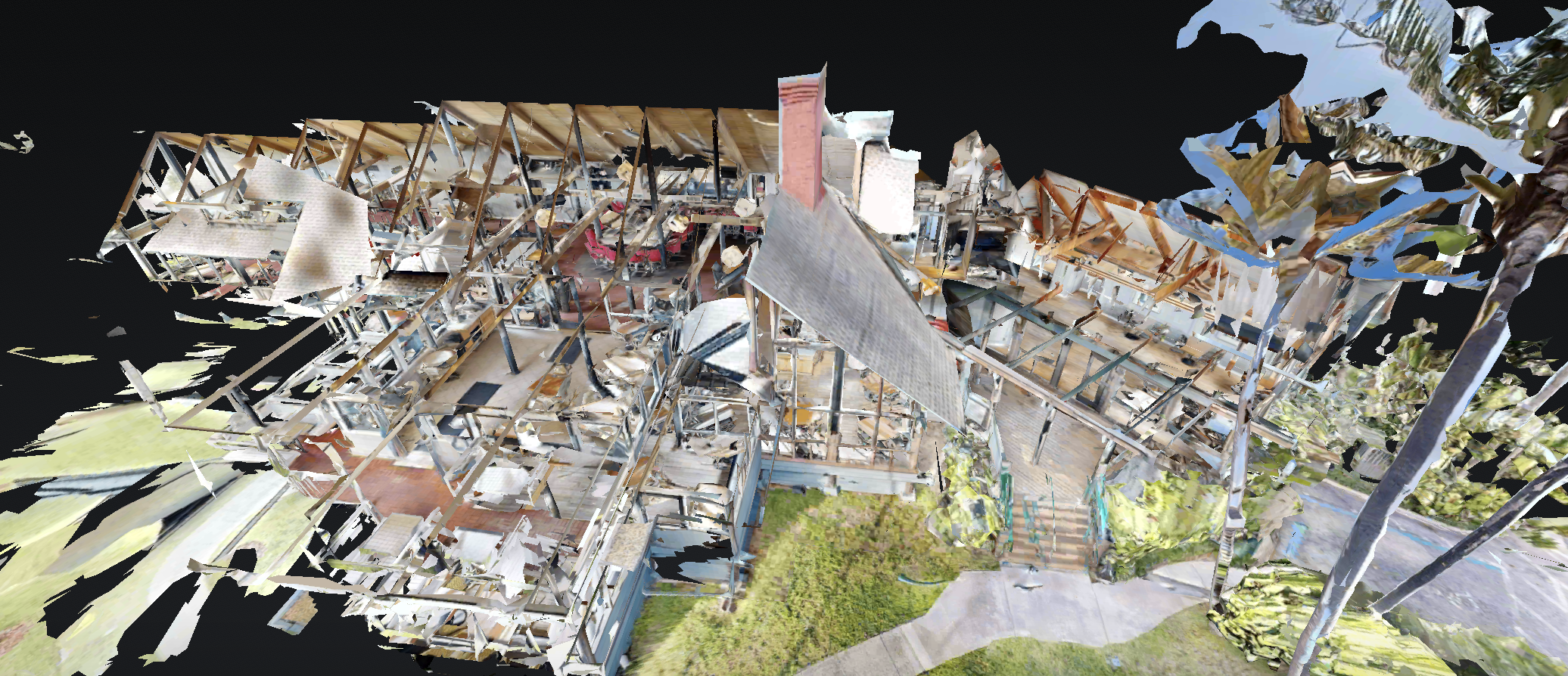 Aerial laser-scan point cloud of the entire Sea Watch restaurant with the roof removed, exposing the post-and-beam structural framing, brick chimney, and interior layout of both floors captured as existing conditions.